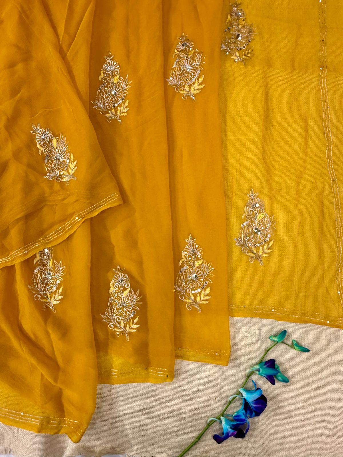 Yellow chiffon saree with debka, sequence and Resham embroidery with crepe blouse