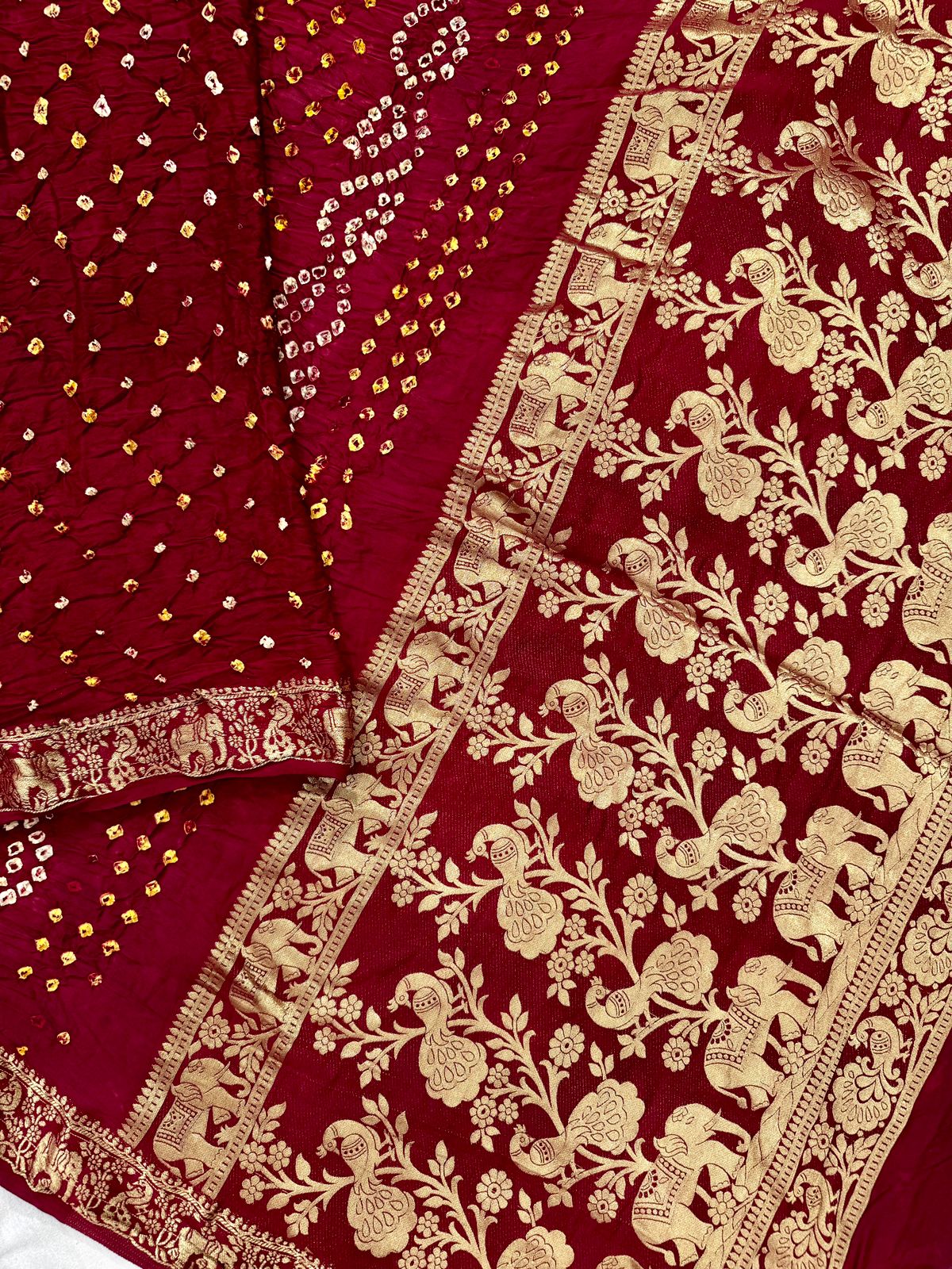 Dark Red Modal crepe Silk bhandhani with zari pallu and border
